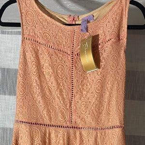 Francescas new with tags gorgeous medium length dress.